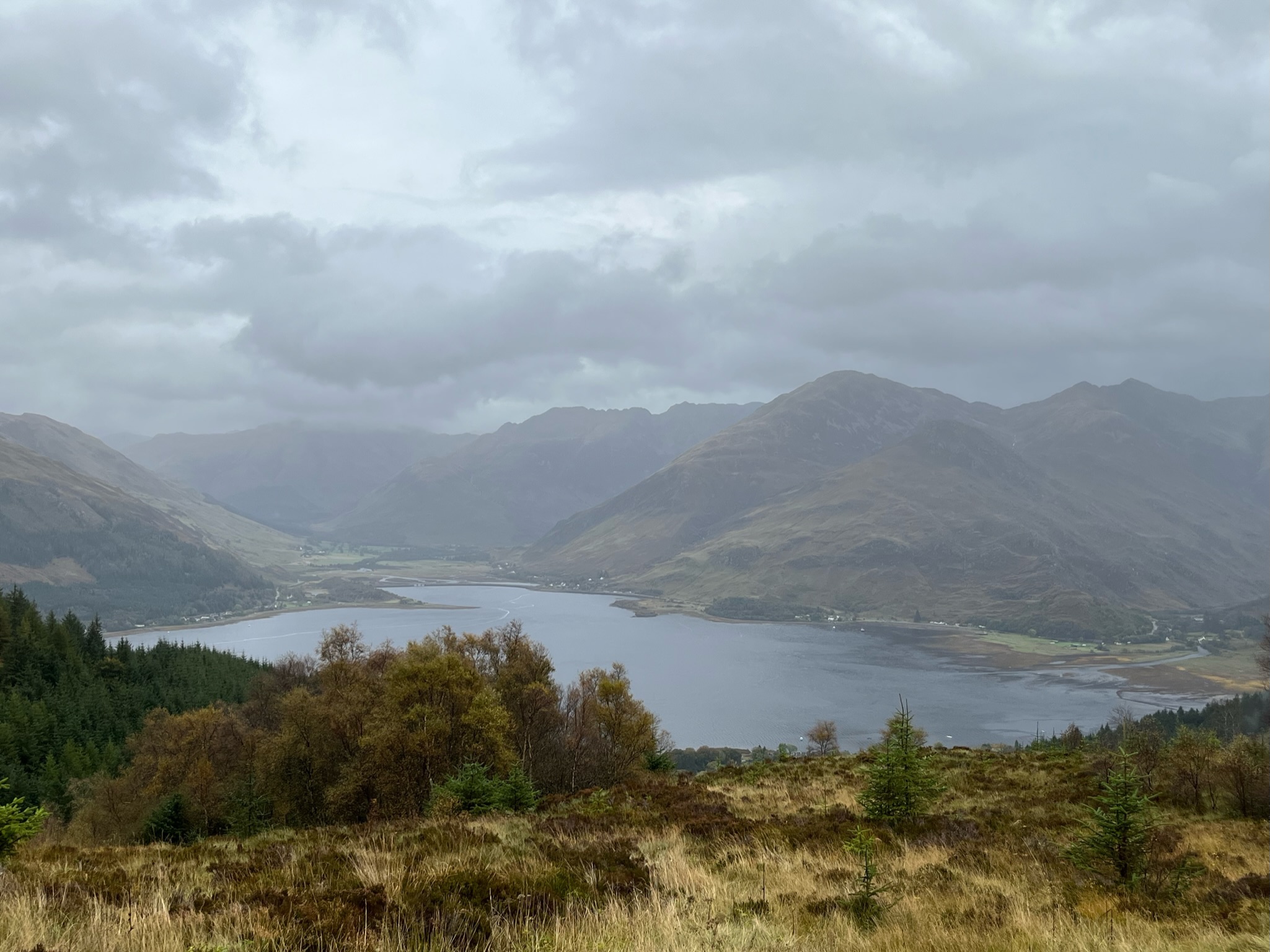Scottish highland loch surrounded by mountains